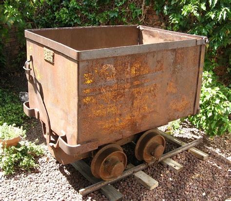 mine cart and metal box|what is a mine cart.